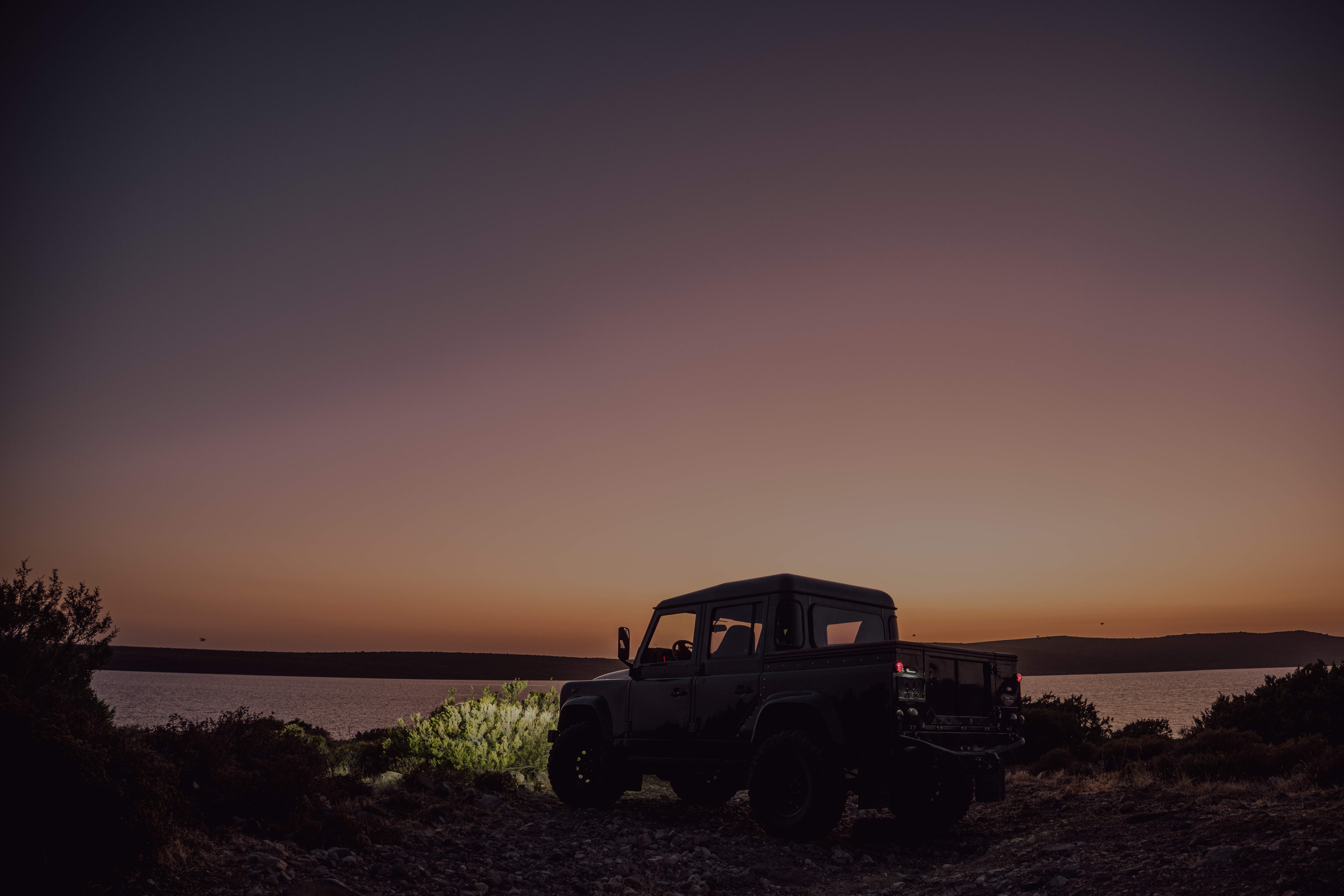 land rover defender 110 sunset