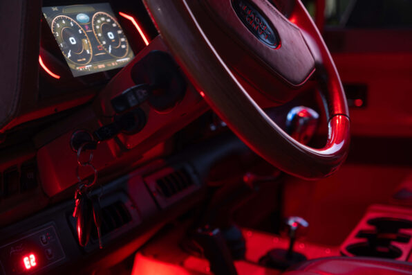 land rover defender steering wheel and modern speedometer