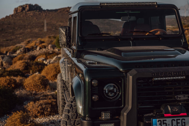 land rover defender front view desert