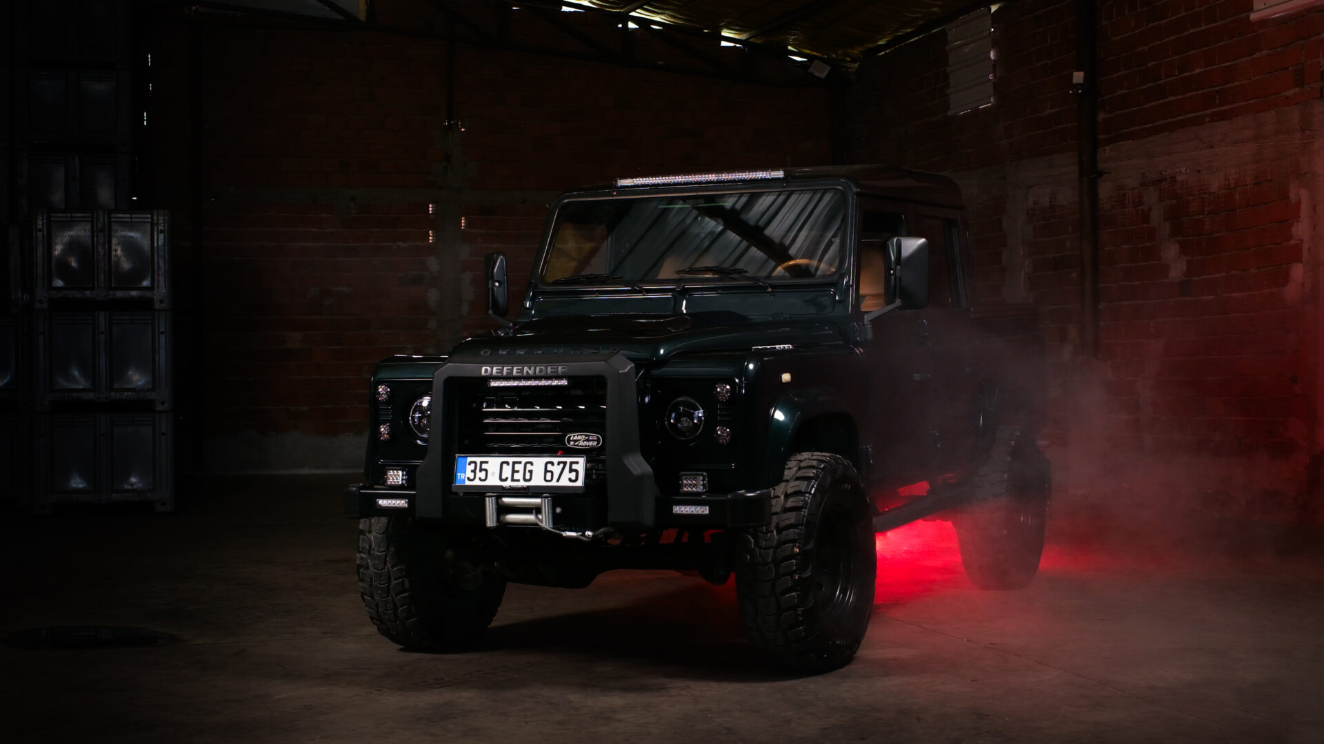 land rover defender 110 in warehouse