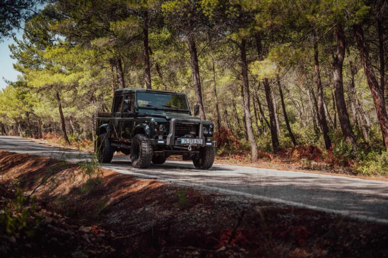 land rover defender 110 in motion