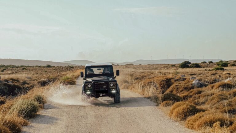 british-racing-green-land-rover-defender-110-offroad