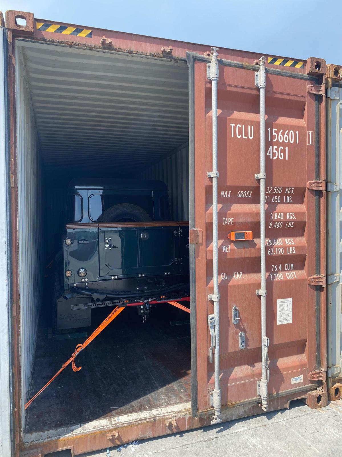 british-racing-green-land-rover-defender-110-container