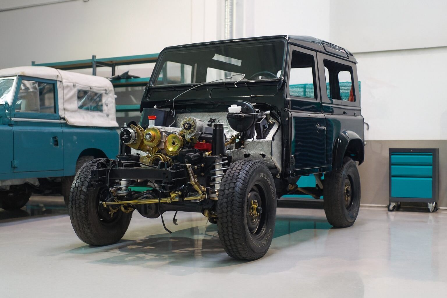 3.5LV8 Engine installed on a Black Land Rover Defender 90