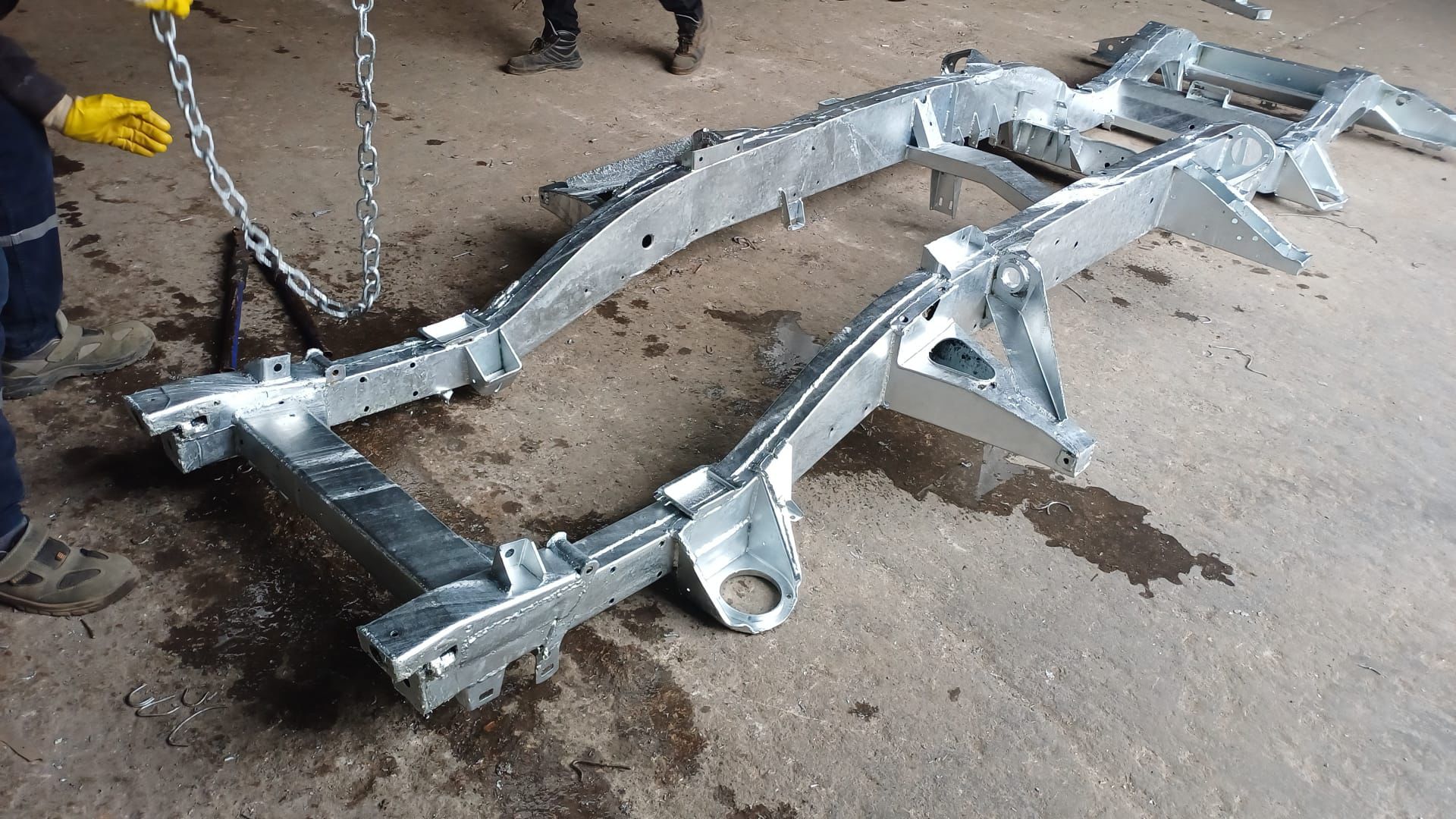 Galvanized Land Rover Defender Chassis after being pulled out of the zinc pool.